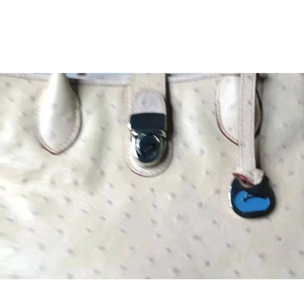 Dooney & Bourke Butter Yellow Ostrich-Embossed Satchel with lilac dots